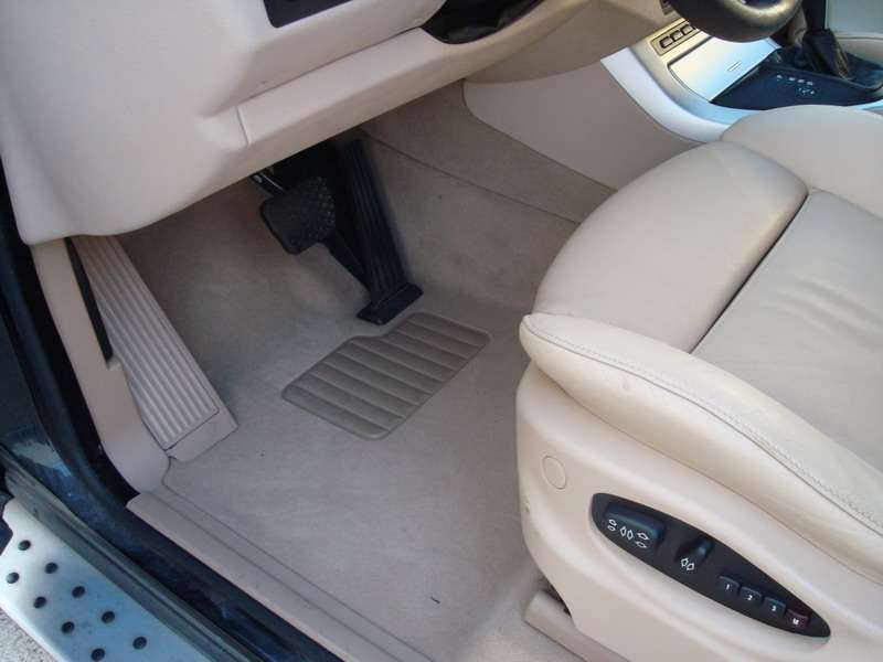 Fotografía de Limpieza de tapicería y tratamiento de cuero a un BMW X5: limpieza interior bmw x5 12